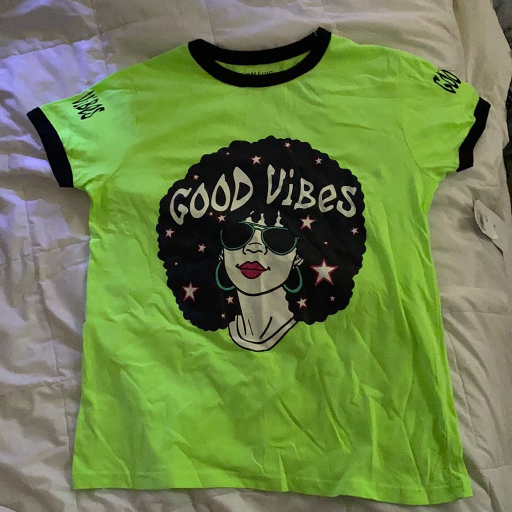 Neon “Good Vibes” green short sleeved tee.